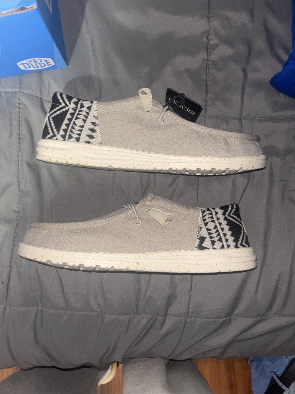 Hey Dude Light Gray Slip-Ons with Black Patterned Heel